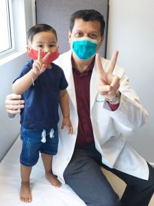 Dr. Mario con Niño
